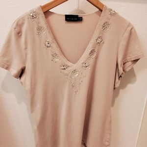 The limited tan beaded neck top